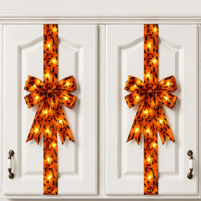 Black Halloween hair bow with fringe tails and LED lights