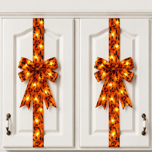 Black Halloween hair bow with fringe tails and LED lights