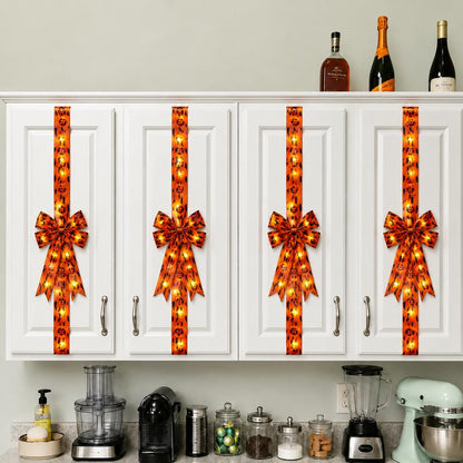 Black and orange Halloween LED hair bows together