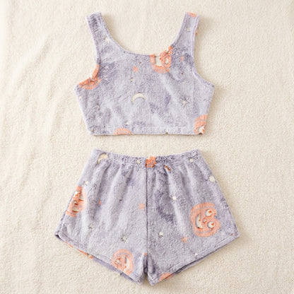 Glow-in-the-dark Halloween pajama set on a dark background