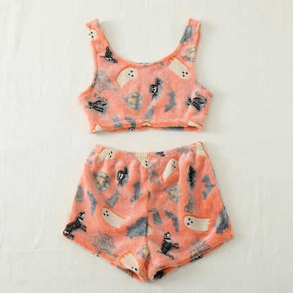 Fleece Halloween pajama shorts and crop tank arranged flat