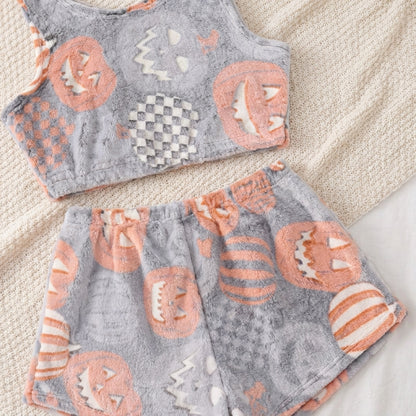 Halloween pajama crop tank and shorts laid flat with glow print detail
